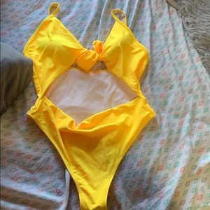 Yellow cutout one piece bathing suit
